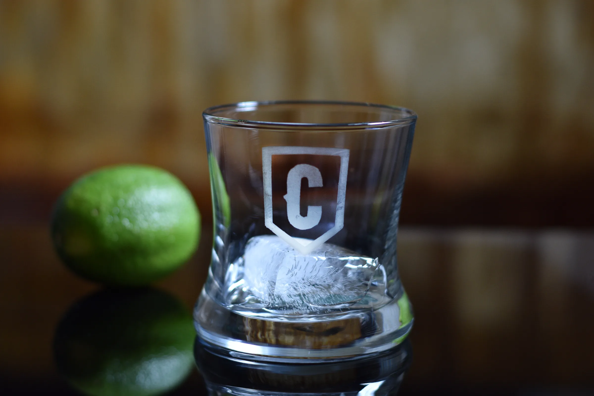 Cut glass tumbler lit to show the facets
