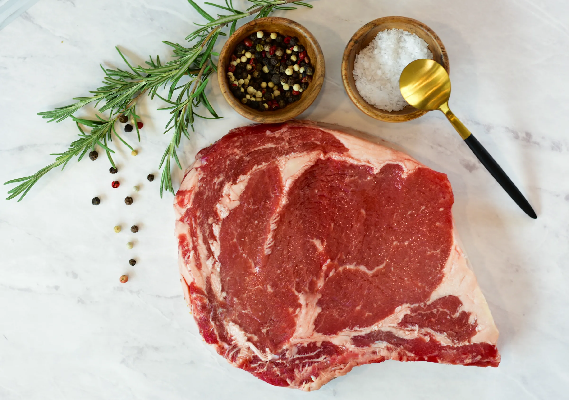 Ribeye finished with a gold spoon
